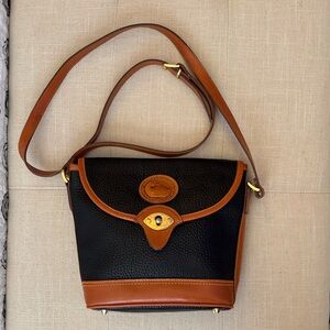 Dooney & Bourke Vintage All weather Leather Black and Tan Crossbody Bag